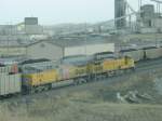 A pair of Union Pacific loks pull an empty coal train onto the staging track at the Thunder Basin Coal Co.