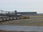 Here a Union Pacific train heads onto the staging track while UP and BNSF trains are being loaded. Nov. 2003.