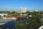 FEC train 123, 2300 Bowden Yard (Jacksonville) - Fort Lauderdale crosses the Tarpon River in Downtown Fort Lauderdale,  22 June 2016.

Traction is provided by 812, 703, 720 & 487.