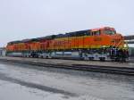 Nearly new BNSF 5894 & 5895 sit at the Burlington, Iowa depot. These loks are parked here while the coal train they pulled from Northeast Wyoming is being unloaded at the coal fired generating plant (electricity) south of Burlington. Anyone interested in extreme close-up photos of the decals, fuel gauge, and so on, please contact me.