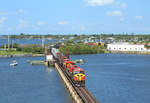 Running a couple of hours late, FEC109-19 crosses the St Lucie River in Stuart whilst making it`s way from Jacksonville Bowden to Miami Hialeah, 19 Feb 2019. 811 & 805 are providing the power.....