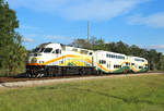 SunRail train P327, 1530 DeBary-Poinciana approaches Sanford, 21 Nov 2018.

102 provides the power at the rear...