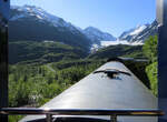 Imposanter Blick auf einen Gletscher in Alaska aus einem Zug: der Bartlett-Gletscher und die soeben befahrene Hufeisenkurve sind aus dem offenen Oberdeck des Dome Cars sehr gut sichtbar. Anchorage - Seward, 26.7.2012