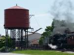 Wasserturm der Strasburg Railroad, PA (02.06.09). Der Museums-Dampfzug fhrt gerade ab.