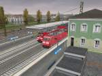 185 087-4 mit ihrem RE Basel SBB - Offenburg und eine DB Regio 146.1  mit ihrem RE nach Basel Bad Bf treffen sich bei Regen in Mlheim(Baden).
