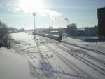 Blick auf den Bahnhof Gomel von der stlichen Seite her. Woher der Zug kam der gerade einfhrt, kann ich leider nicht sagen. 06.01.2009 um 11:48 Uhr. 