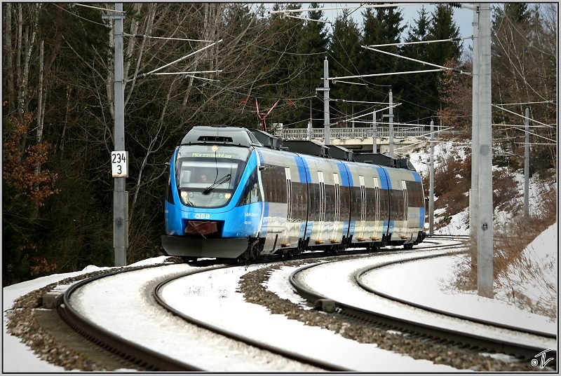 Triebwagen 4024 120  S-Bahn Steiermark  fhrt als REX 1702 von Villach nach Mrzzuschlag.
Zeltweg 7.2.2009