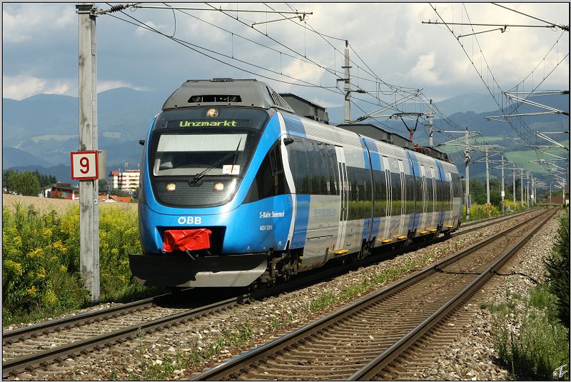 Triebwagen 4024 120  S-Bahn Steiermark  fhrt als R 4215 von Bruck an der Mur nach Unzmarkt.
Zeltweg 7.8.2009