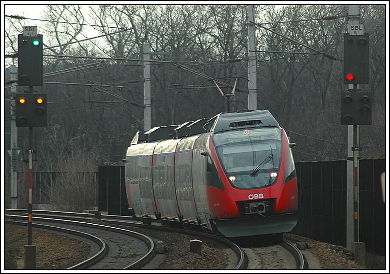 Triebwagen der Reihe 4024 als RSB 9 von Wien Sd ber Floridsdorf nach Wiener Neustadt am 28.1.2007 bei der Durchfahrt der Haltestelle Praterkai. (Gegenlichtaufnahme)