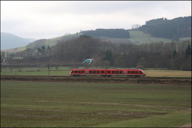 Unbekannter 648er verlsst als RE57, (RE 29513)  Dortmund-Sauerland-Express, nach Bestwig den Haltepunkt Freienohl. (11.12.2007)