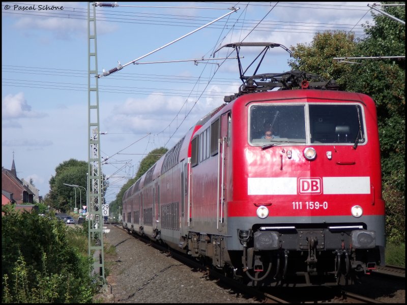 Und hier eins der am besten gelungenen Fotos des Tages, die 111 159-0 als Zug Lok am RE4 nach Aachen Hbf.
uafgenommen um 17:18.