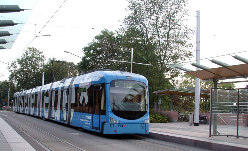  Unsere Neue  steht auf der siebenteiligen Variobahn 276 am S-Bahn Haltepunkt Heidelberg West-/Sdstadt. (11.06.2006)