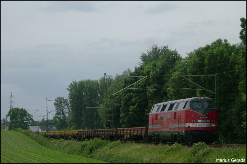 V180 321  Adam8  mit leeren Flachwagen gen Mnchengladbach am km 28.8 KBS485 Gru´an den Tf! 27.5.2009