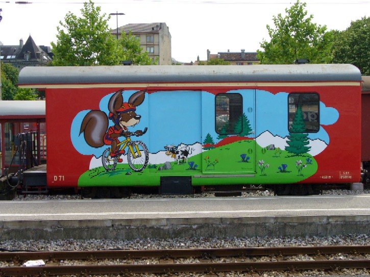Velo Gepckwagen D 71 der Schmalspurbahn von Yverdon nach Ste.Croix ( Travys Gruppe ) im Bahnhof von Yverdon am 30.07.2006
