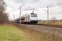 186 429-7 Railpool GmbH wohl für die HSL Logistik GmbH im Einsatz mit einem Lexus/Toyota Autotransportzug in Nennhausen und fuhr weiter in Richtung Wustermark. 21.03.2017