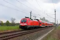Die 182 007 mit dem RE 4358 von Oranienburg nach Rostock Hbf am 28.04.2017 in Nassenheide.