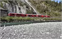 RE1758 mit ABe 4/16 3103 auf dem Rückweg nach Chur bei Trin. (10.05.2017)