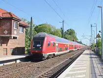 Sonderzug geschoben von einer unbekannt gebliebenen BR 146 mit 7 Dosto zum Kirchentag 2017 von Berlin nach Lutherstadt Wittenberg am 28. Mai 2017 in Großbeeren.
  				
