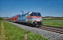 146 247-2 ist am 10.05.2017 mit einen RE in Richtung Hbf. Würzburg/M. bei Retzbach-Zellingen zu sehen.