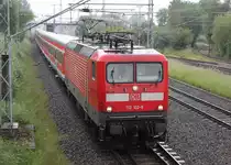 112 102 mit RE 13290 von Warnem�nde nach Berlin-Ostbahnhof bei der Durchfahrt in Rostock-Bramow.04.06.2017 