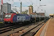 Durchfahrt am 12.10.2015 von Re 482 000-7  Köln  mit einem Kesselzug über Gleis 1 durch den Badischen Bahnhof von Basel in Richtung Rangierbahnhof Muttenz.