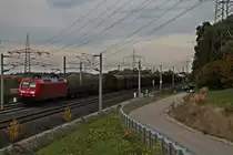 Am 24.10.2015 fuhr 145 050-1  Dienstfahrt  mit einem gemischten Güterzug bei Schliengen kurz vor dem Katzenbergtunnel in Richtung Schweizer Grenze.