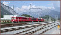 Be 4/4 Pendelzug mit Steuerwagen 1714 bei Ems Werk auf der Fahrt von Thusis nach Chur. Im Vordergrund die neuen, elektrifizierten  Dreischienengeleise zur Grosss�gerei Stallinger und zur Ems Chemie. (01.05.2007)