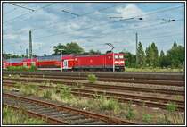 Die Dortmunder 112 156 wartet mit einem  Rhein-Haard-Express  im Bahnhof Haltern am See, auf die Weiterfahrt nach M�nster (Westf).

