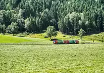 VT 35 fährt mit dem VS 43 als R 8710 (Tamsweg - Unzmarkt) zwischen Einach und Stadl a. d. Mur vorüber.
Aufgenommen am 31.7.2017.