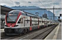 RE4863 mit 511 037 von Wil nach Chur in Buchs SG. (09.08.2017)