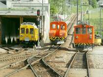 Stimmungsbild im Bhf.Poschiavo.Von links:  Nostalgie  Triebwagen ABe 4/4 Nr.34, Ge 2/2 Nr.162 und De 2/2 Nr.151.Poschiavo 09.05.07