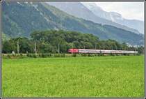 Eine 1116 rasst mit dem OEC160  Maria Theresia  von Wien West nach Z�rich HB. Aufgenommen am 17.06.05 bei Stans b. Schwaz.