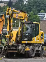 Ein Liebherr 922 Rail Zweiwegebagger am Bahnhof in Hattingen. (August 2017)