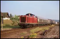 211195 ist hier am 4.7.1991 um 7.18 Uhr mit einem Personenzug aus Silberlingen auf der KBS 802 nach Miltenberg bei Wörth unterwegs.
