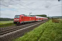 146 242-3 ist mit einen RE Linie 54 in Richtung Bamberg unterwegs,gesehen am 07.09.2017 bei Retzbach.