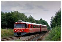 Ein ML-Triebwagen auf der Hornbækbanen zwischen Helsingør und Gilleleje am Haltepunkt Firhøjvej. 

26.08.2006 (M)