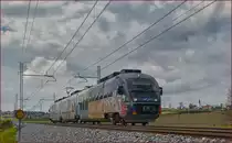SŽ 312-110 fährt an Črešnjevec vorbei Richtung Maribor. /4.10.2017