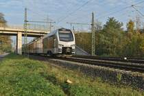 ET25 2301 ist als RE19 Führungsfahrzeug am Morgen des 4.11.2017 nach Düsseldorf Hbf in Lintorf vor meine Kamera geraten.
