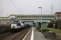 203 764 (zum Aufnahmezeitpunkt für Chemion im Einsatz) mit der Übergabe von Krefeld-Uerdingen (mit Zwischenstopp in Dormagen) nach Gremberg, abgelichtet vom Bahnsteig des Haltepunkts Dormagen Chempark am 8. März 2012.