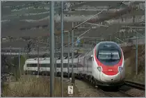 Ein SBB RABe 503 (ETR 610) als EC 32 von Milano kommend, auf dem Weg Richtung Genève
kurz nach St-Saphorin.
4. März 2017
