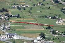 RhB - Regionalzug 464 von Tirano nach St.Moritz am 29.08.1993 in der 70-Promille-Rampe oberhalb Brusio mit Triebwagen ABe 4/4 II 49 + ABe 4/4 II 42 - 2x B - BD - 4x B. Hinweis: gescanntes Dia.
