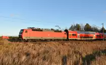 RE1 des Hanse-Express kommend aus Schwerin, mit der schicken 120 202-7 in Front. 04.12.2017, 3km östlich von Büchen.