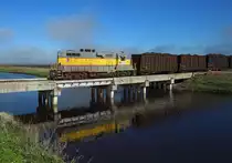 303 approaches Bryant with a rake of loaded sugarcane, 22 Nov 2017.

At Bryant 303 will swap it`s loaded cars for empties and return back to the fields for loading