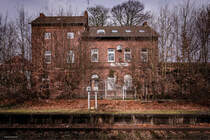 Das ehemalige Bahnhofsgebäude von Bad Iburg an der Strecke der Teutoburger Wald-Eisenbahn (05.02.2017).
