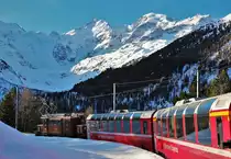 RhB: Das legendäre  Bernina-Krokodil  Ge 4/4 Nr. 182 durfte am 28. Januar 2018 am Zugschluss des Bernina-Express (BEX) von Pontesina nach Ospizio Bernina mitfahren. Es handelte es sich um eine Überfuhr der Lok anlässich der Dampfschneeschleuderfahrt am Berninapass. 

Das Bild entstand von einem Regionalzug bei der bekannte Montebellokurve. Das Panorama mit Morteratschgletscher kurz vor Ospizio Bernina. 
Ab Ospizio Bernina wurde dann das Bernina-Krokodil abgekoppelt und die im Bild zusehenden Panoramawagen fuhren weiter als R nach Tirano.