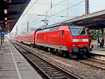 146 028 als RE 30 nach Halle in Magdeburg Hauptbahnhof am 17. Februar 2018.

