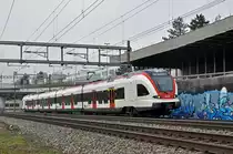 RABe 522 207, auf der S1, fährt Richtung Bahnhof Muttenz. Die Aufnahme stammt vom 05.02.2018.