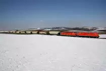 NLB - Tandem 2143.56 und 070-7 mit dem SLGAG 97414 am 25.Februar 2018 zwischen Naglern und Ernstbrunn.