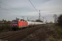 Am 06.01.2018 fuhr 143 822 von RBH mit einem leeren Kesselwagenzug durch Ahlten an der Fotostelle.