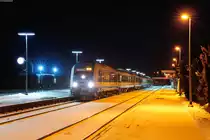 223 065 mit dem ALX 84110 von München Hbf nach Hof Hbf beim kurzen Halt in Wiesau (Oberpf), 06.01.2017